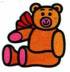 ein Teddybär mit roter Schleife